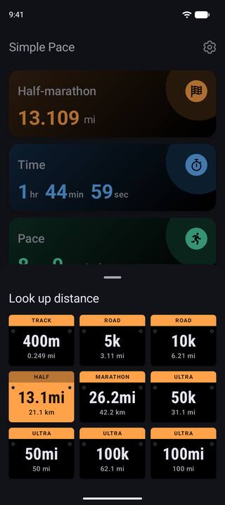 The race distance sheet in dark mode, laid out as race bibs: 400m, 5k, 10k, half-marathon, marathon, and the 50k, 50 mile, 100k and 100 mile ultra-marathons.