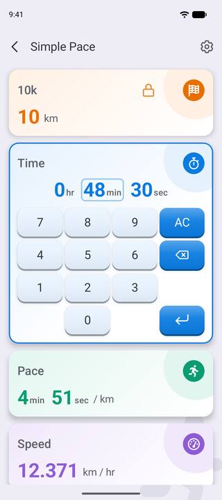 The time card open with the number pad, entering 48 minutes 30 seconds for a 10k and updating the pace to 4:51 per kilometer.