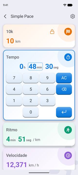 O cartão de tempo aberto com o teclado numérico, digitando 48 minutos e 30 segundos para um 10k e atualizando o ritmo para 4:51 por quilômetro.